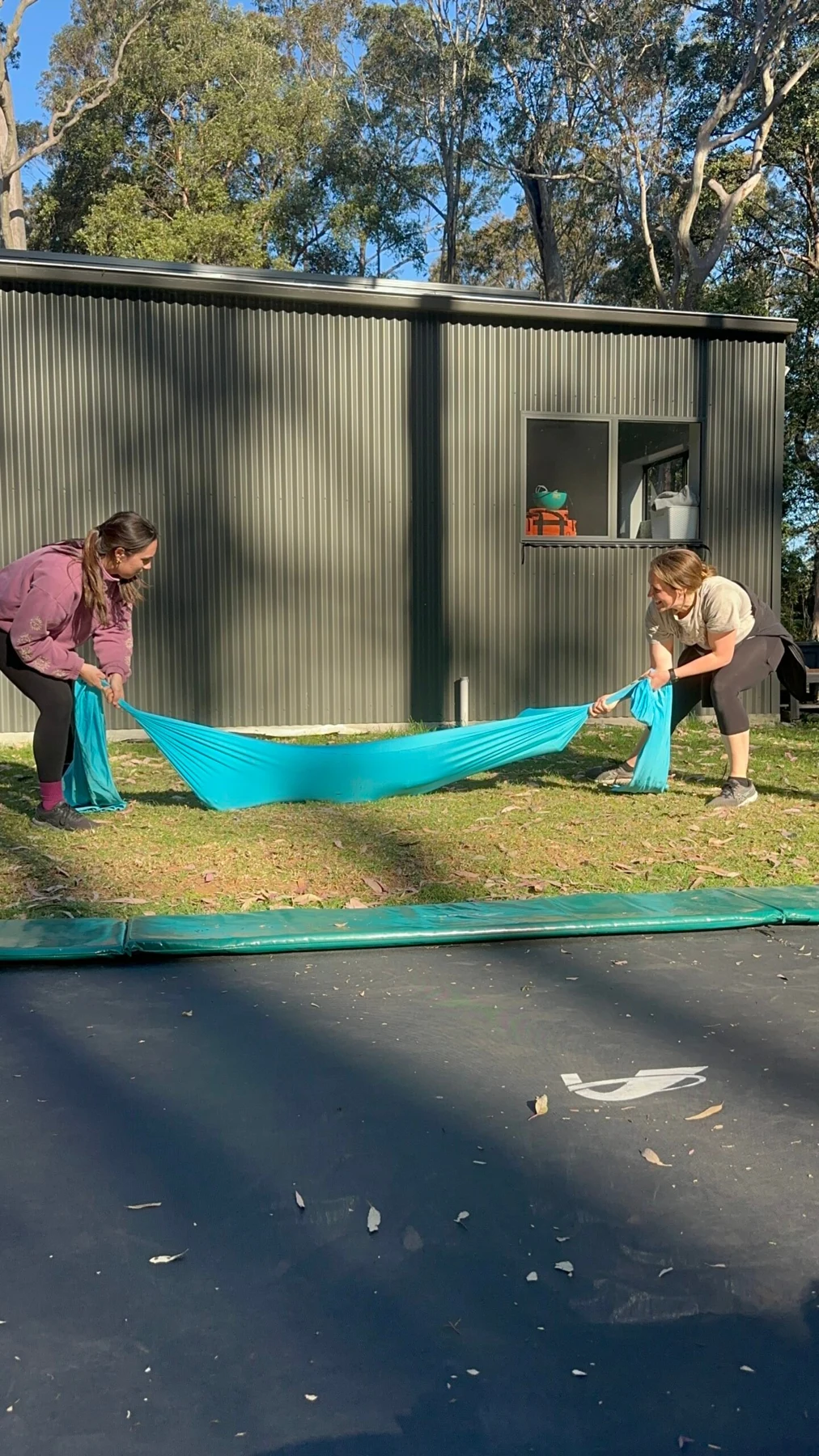 A child playing in an indoor therapy space.